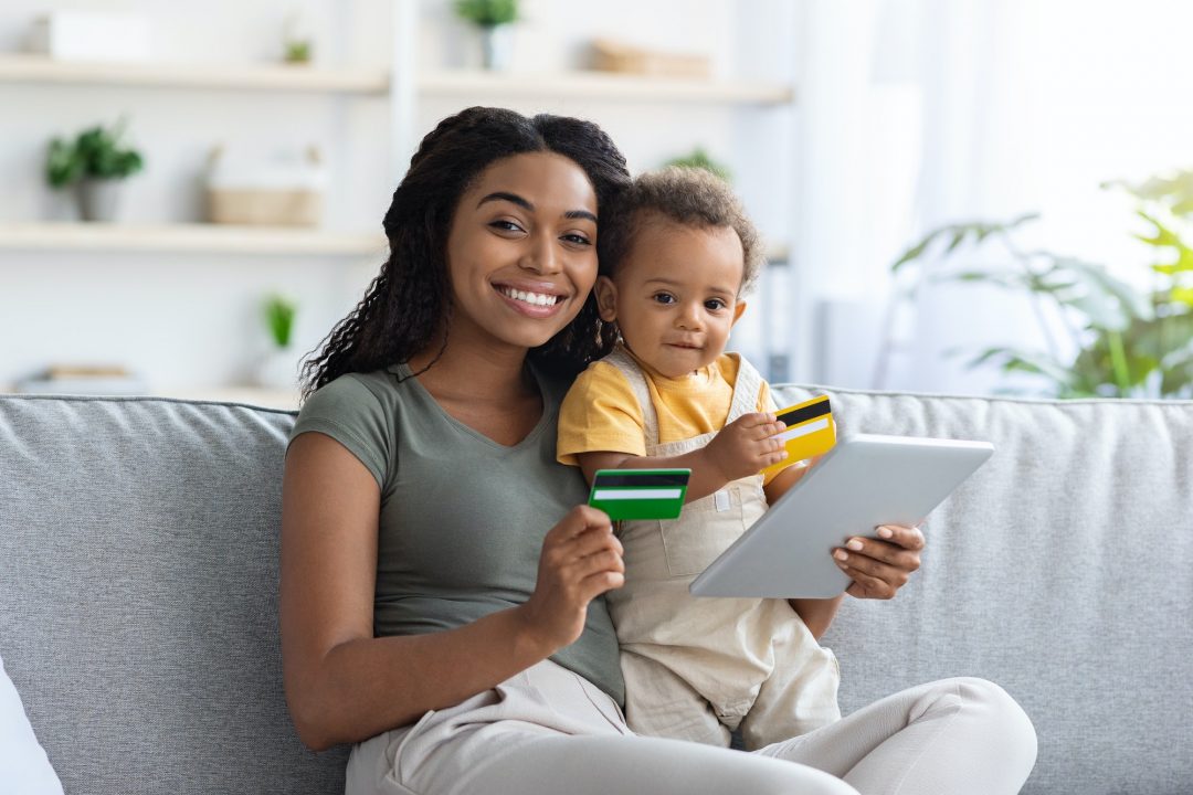 online-payments-black-mom-and-child-using-digital-tablet-and-credit-cards.jpg